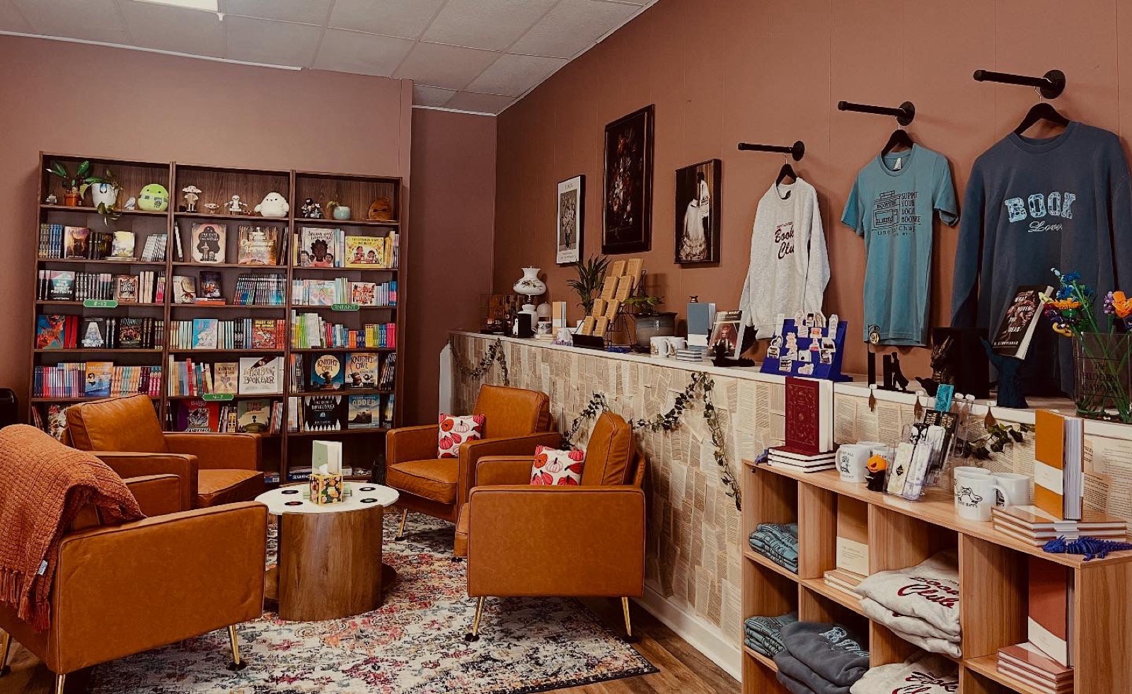 Cozy seating area and book displays inside One Last Chapter
